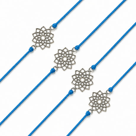 Silver filigree lotus flower charm on vibrant blue cord rakhi bracelet traditional handcrafted gift for brother