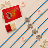 Four blue cord designer lotus charm rakhi bracelets with silver toned floral pendants for raksha bandhan gift