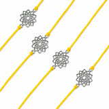 Designer lotus charm rakhi with silver filigree flower charms on bright yellow cord bracelets for raksha bandhan gift