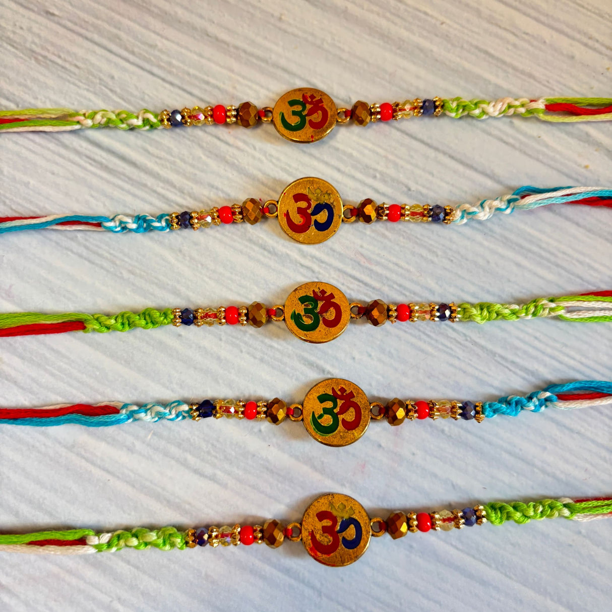 Religious Om Rakhi for Brother & Bhabhi – Handcrafted Adjustable Thread Bracelet, Protection & Good Luck Gift for Raksha Bandhan
