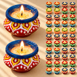 Handmade clay matki diya filled with wax for Diwali pooja featuring vibrant red yellow and blue colors with white patterns