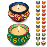 Hand-painted matki clay diya with vibrant red and yellow patterns on deep blue rim for diwali pooja and home decor