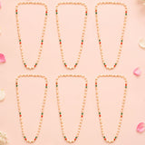 Six handmade barati swagat mala necklaces with cream artificial moti pearls and red green beads for wedding celebrations