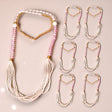 Handmade Swagat Mala Set with multi-strand white pearl necklace, pink beads, gold accents, and heart pendant