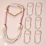 Handmade Swagat Mala Set with multi-strand white pearl necklace, pink beads, gold accents, and heart pendant