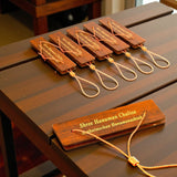 Wooden prayer beads with gold cord on Hanuman Chalisa book