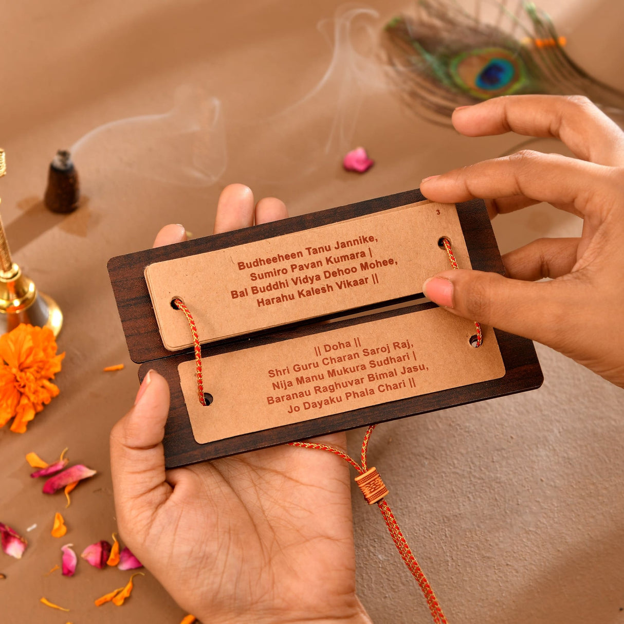 Brown wooden bookmark with engraved text and leather strap for Hanuman Chalisa book