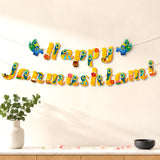 Vibrant yellow happy janmashtami banner with blue peacock motifs and traditional indian festival elements for indoor outdoor decor