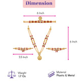 Gold-toned pearl jewelry set with intricate red and clear bead accents including necklace armlets and crown for murti shringar