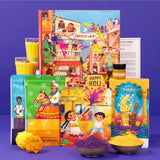 Premium Holi gift box with colorful illustrated festive scenes, purple orange gulal, thandai mix, chandan tika, and greeting card