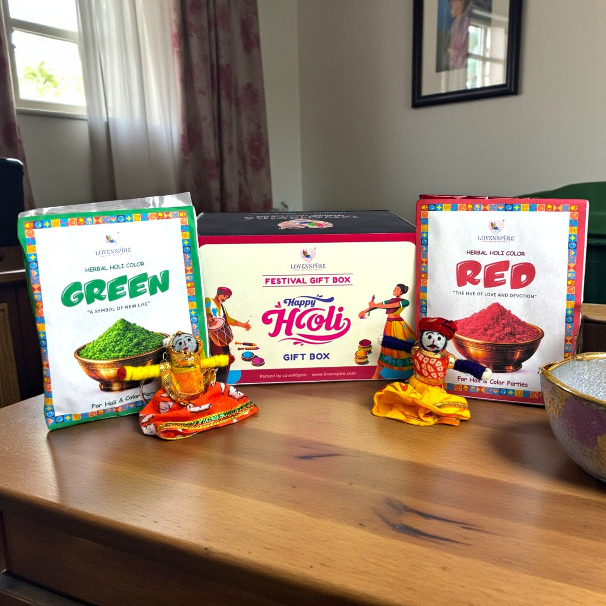 Handmade Holi gift box with red green gulal colors, keychains, festive figurines
