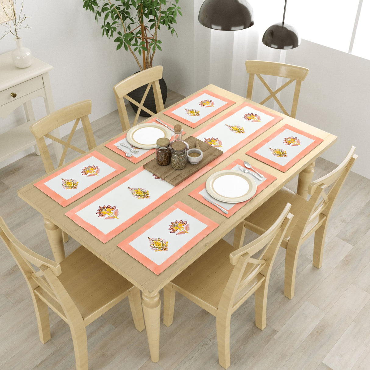 Six coral-bordered autumn leaf placemats on wooden table from 13-pc cotton set