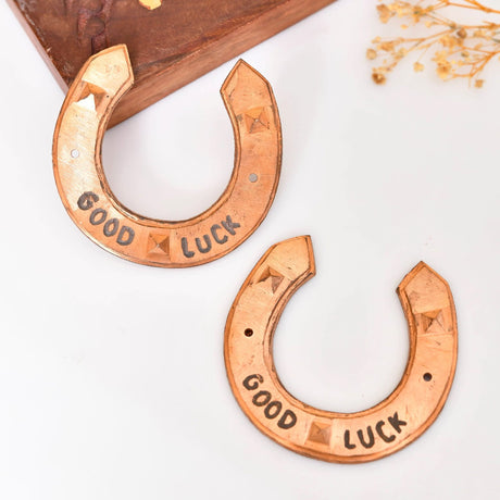 Copper-colored horseshoes with Good Luck inscription for Rustic Western Wall Decor
