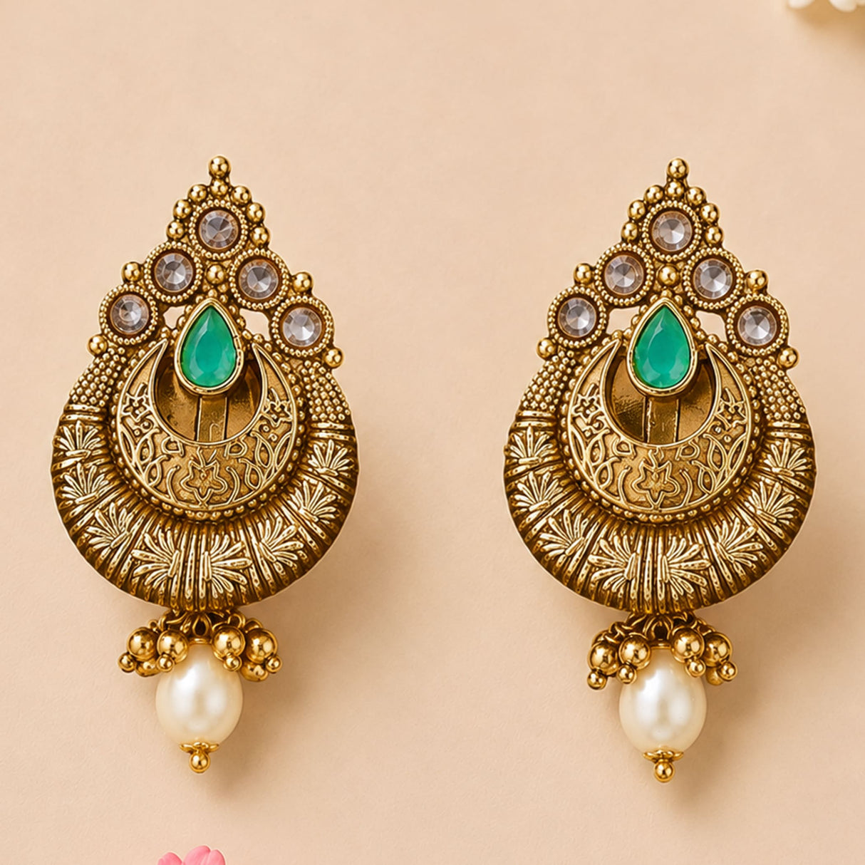 Indian kundan and faux pearls gold tone chandbali earrings with emerald and clear stones for wedding and ethnic wear