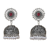 Boho oxidized silver jhumka earrings with intricate filigree red gemstone and pearl dangles for weddings and ethnic wear