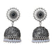 Boho oxidized silver tone jhumka earrings with intricate floral designs black gemstone and pearl dangle for ethnic wear