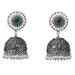 Boho oxidized silver-tone jhumka earrings with intricate filigree, green gemstone, clear stones, and pearl dangles for ethnic wear