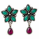 Indian oxidized silver floral earrings with emerald green marquise stones and ruby teardrop pendant for ethnic wear