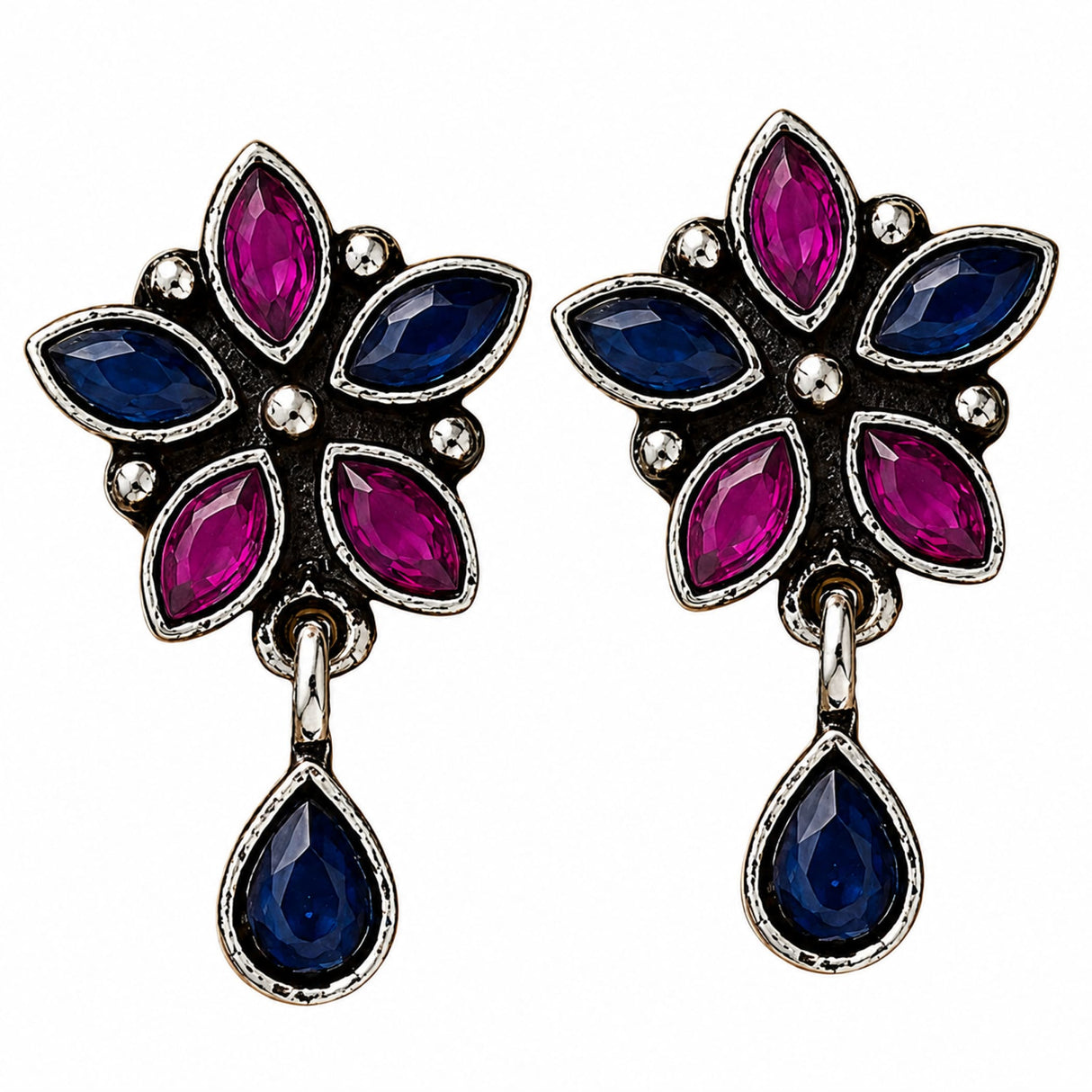 Indian oxidized floral earrings with vibrant fuchsia and deep blue stones in silver frame for Diwali and wedding wear