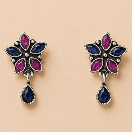 Indian oxidized floral silver earrings with magenta and deep blue stones for Diwali wedding and ethnic wear