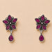 Indian oxidized silver floral earrings with vibrant fuchsia gemstones and teardrop pendant for traditional ethnic wear