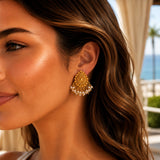 Indian chandbali gold tone dangle pierced earrings with teardrop top and pearl accents for wedding and ethnic wear