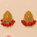 Indian chandbali gold tone dangle earrings with intricate beads and red bead drops for wedding and ethnic wear
