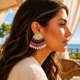 Gold-toned indian kundan stone and faux pearl multi-tiered dangle earrings with white pearls and purple beads for ethnic wear