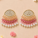 Gold toned Indian kundan stone and faux pearl chandbali earrings with peach pink beads for wedding and ethnic wear