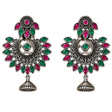 Indian oxidized silver floral chandbali earrings with vibrant pink and green gemstones and dangling bell jhumki for women