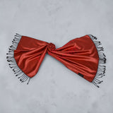 A vibrant red satin indian pashmina shawl with black fringe detailing soft wool wrap perfect gift for her
