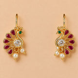 Indian peacock drop earrings in gold tone with red rubies green emeralds clear diamond and dangling white faux pearls