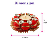 Red and gold decorative diya stand with crystal embellishments for Diwali pooja and festive home decor