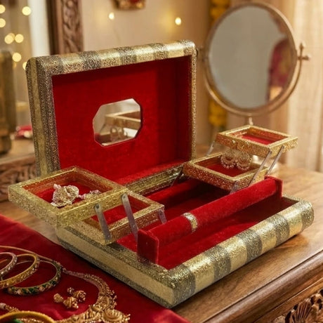 Gold-embossed jewelry box organizer with red velvet interior and bangles holder