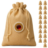 Beige jute potli bag with red gemstone centerpiece pearls and gold beads for indian wedding diwali and gift favors