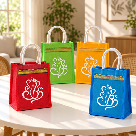 Red jute tote bag with white ganesha emblem and gold trim ideal for wedding pooja diwali and traditional Indian gifts