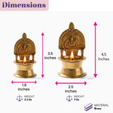 Brass kamakshi deepam diya oil lamp with intricate deity carvings and lit candle for diwali pooja and home mandir