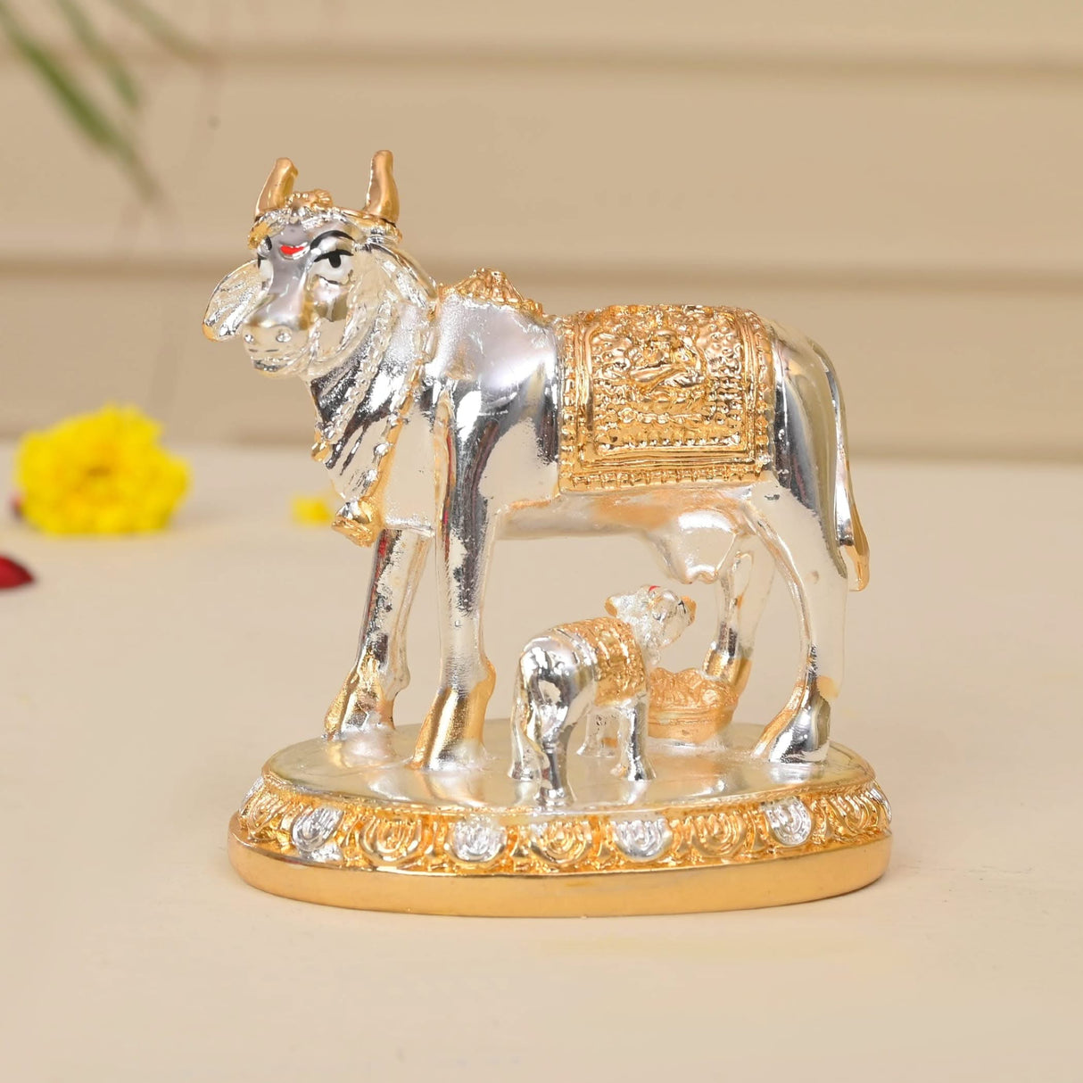 Silver and gold cow and calf figurine for home temple Diwali puja decoration