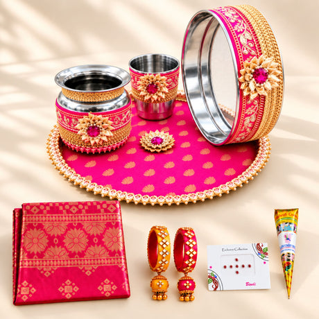 Pink and gold karwa chauth pooja thali set with intricate floral patterns and beaded edges for festive gifting
