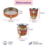 Red and gold ornate stainless steel ceremonial cups with pearl embellishments in karwa chauth pooja thali set for women