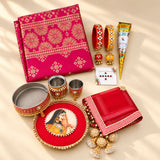 Red and gold embroidered silk dupatta with intricate floral patterns in karwa chauth pooja thali set for women