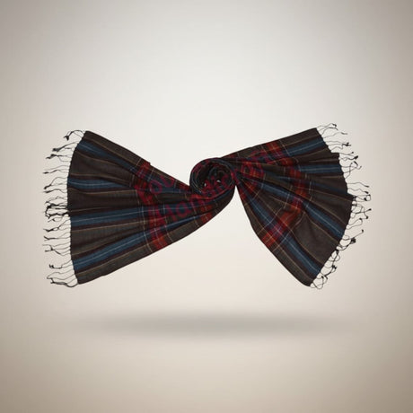 Pashmina shawl with a dark plaid pattern of red and blue stripes and black fringed edges perfect as a gift for her