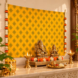 Golden ganesha and saraswati statues on an ornate brass altar with marigold and white flowers on kolam rangoli print backdrop