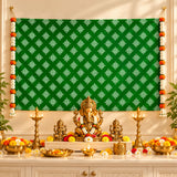 Golden ganesha idol adorned with floral garland seated on ornate pedestal with kolam rangoli print backdrop and artificial garlands