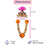 Jewelry set for Janmashtami featuring a vibrant pink feathered mukut crown with red blue gemstones and orange floral necklace