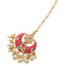 A vibrant red and gold kundan chand tikka maang tikka with clear stones pearls gold plating for Indian wedding fashion