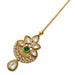 Gold plated kundan work maang tikka with floral design clear crystals green gemstone and adjustable chain for wedding use