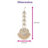 Gold-toned chandbali maang tikka with intricate filigree design set with clear crystals and white pearls for bridal wear