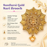 Sunburst gold sari brooch with intricate indian-inspired detailing, antique gold alloy, sparkling stones, pearl pendant for weddings