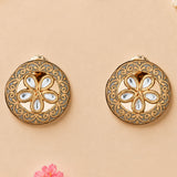 Indian kundan stud earrings in gold tone with intricate filigree and floral arrangement of clear teardrop stones